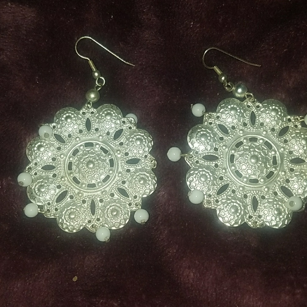 Silver earrings with with beads.